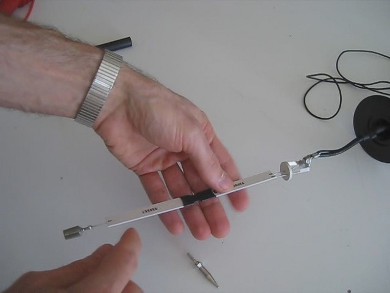 The insides of the Fluke 80k-40 40kV high voltage probe showing
      the thin film resistors.