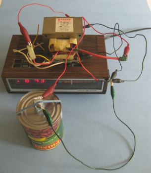 The clock radio wired up to the microwave oven transformer and from there to the rochelle salt piezoelectric crystal speaker.