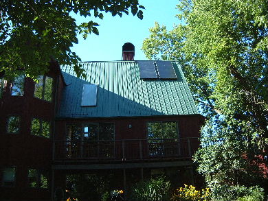 Two Enerworks flat panels installed on a roof.