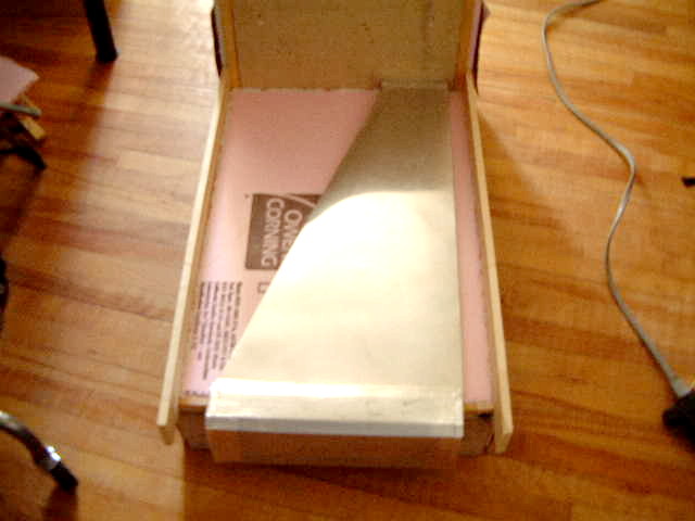 Extruded polystyrene rigid board in window solar air heater.