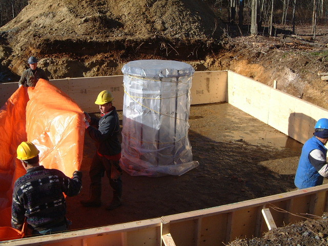 Covering the ground with a tarp.