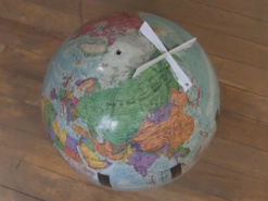 The plastic cross with magnets on the homemade/DIY BB-8 droid's 
      ball.