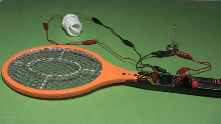 Electric fly swatter powering a CFL taken apart for testing
      which resistance gives the best light.