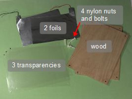 All of the parts for the flat place Tesla coil capacitor.