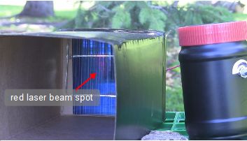 Closeup of the red spot sent by the laser communicator on the solar cell.