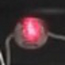 Photo of a photoresistor with a laser light shining on it.