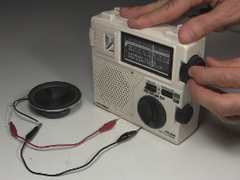 Tuning the radio to a station before measuring the resistance of the photoresistor/photocell.