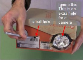 Making the small hole for the pinhole camera.