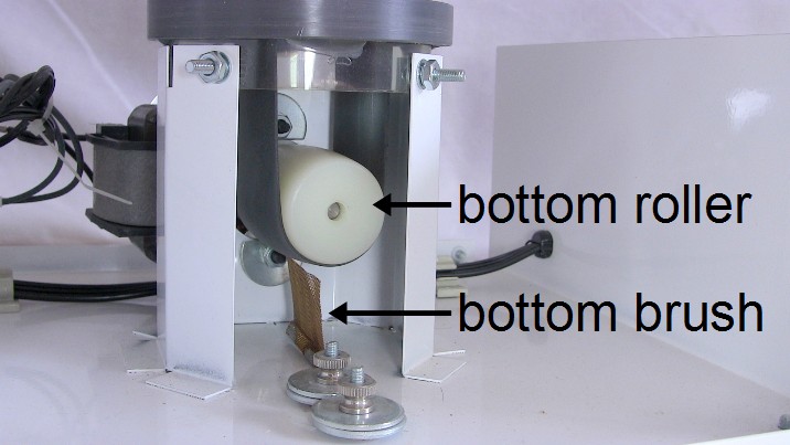 Van de Graaff generator's bottom roller and brush.