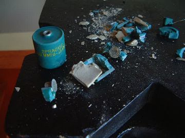 Barium titanate doorknob capacitor smashed open to show the
      capacitor plates.