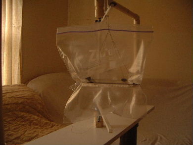 Plastic bag test for Poynting flow thruster with bare wire 
      left alone.