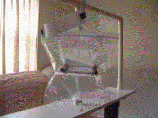 Animated gif made from movie of Poynting flow thruster test 
      with paper strips redirecting ionized airflow from bare wires.