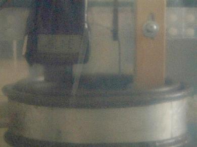 Phototachometer showing 3175 RPM for the non-conventional
      propulsion experiment involving a charged rotating cylinder.