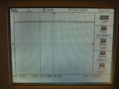 Oscilloscope showing 13.8kV for the non-conventional
      propulsion experiment involving a charged rotating cylinder.